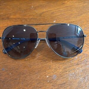Michael Kores blue lens sunglasses.